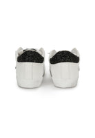 Sneaker prime star in pelle bianca con dettagli in pelle in glitter nero 
