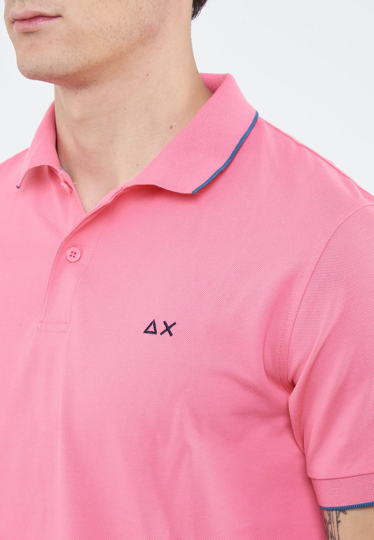 Polo con dettagli a contrasto in cotone fuxia 