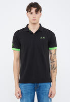 Polo con maxi logo in cotone nero 