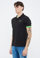 Polo con maxi logo in cotone nero 
