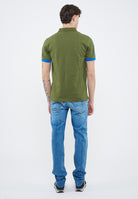 Polo con maxi logo in cotone verde scuro 